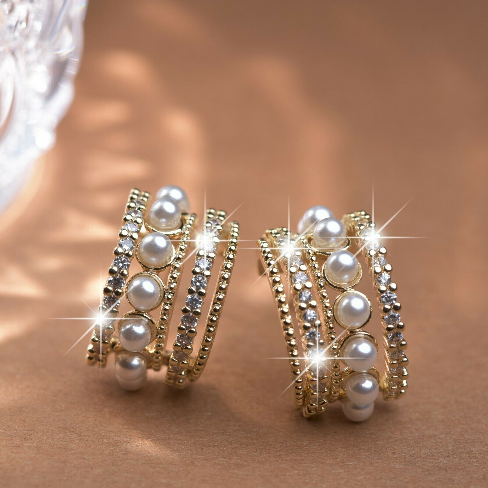 18k yellow gold stud made with Swarovski crystal fashion pearl huggies earrings